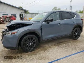 2023 Mazda CX-5 S Carbon Edition z VIN JM3KFBCM2P0118439, wystawiony jako Copart lot #54956405 z przebiegiem 24 114 mil mil oraz Szkody całkowita. Historia ofert i sprzedaży dostępna na DreamBid. Obrazek 1.