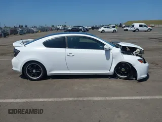 2006 Scion tC with VIN JTKDE167160120517, listed as a IAAI auction lot 42111042 with 174,220 mi miles. Bid and sale history available at carsss.com. Image 14.