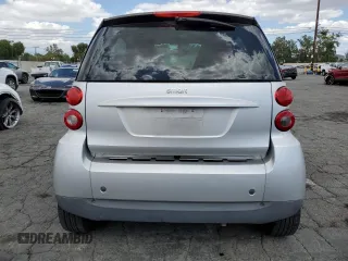 2009 Smart fortwo Pure with VIN WMEEJ31X89K251402, listed as a Copart auction lot 56791545 with 52,636 mi miles and Clean title. Bid and sale history available at DreamBid. Image 6.