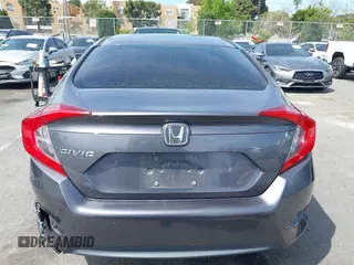 2017 Honda Civic LX with VIN 2HGFC2F52HH566363, listed as a IAAI auction lot 41934807 with 94,063 mi miles and . Bid and sale history available at DreamBid. Image 16.