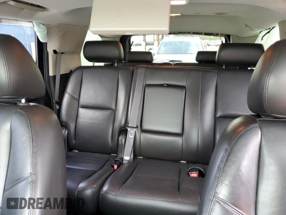 2010 Chevrolet Tahoe LTZ with VIN 1GNUKCE01AR127365, listed as a Copart auction lot 60711715 with 151,962 mi miles and Salvage title. Bid and sale history available at DreamBid. Image 10.