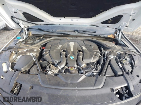 2017 BMW 7 Series 750i with VIN WBA7F0C58HGM21467, listed as a IAAI auction lot 41632663 with 136,620 mi miles. Bid and sale history available at carsss.com. Image 10.