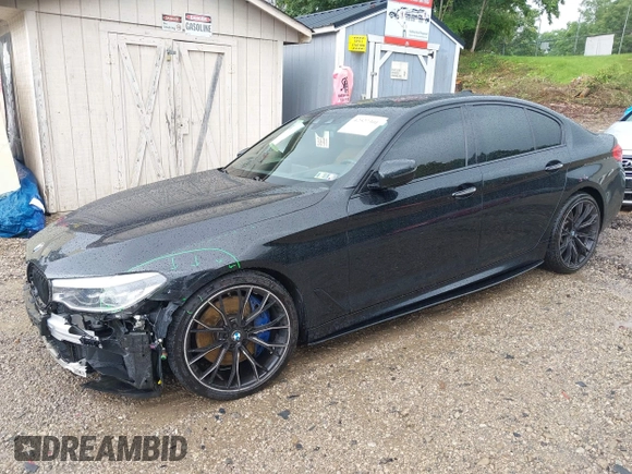 2018 BMW 5 Series M550i xDrive with VIN WBAJB9C5XJB286923, listed as a IAAI auction lot 42527301 with 76,923 mi miles and . Bid and sale history available at DreamBid. Image 22.