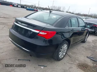 2013 Chrysler 200 Touring with VIN 1C3CCBBB4DN602086, listed as a IAAI auction lot 41932742 with 151,366 mi miles and . Bid and sale history available at carsss.com. Image 4.