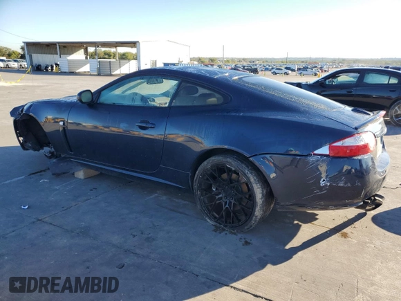 2008 Jaguar XK with VIN SAJWA43C589B23096, listed as a Copart auction lot 79337334 with 143,902 mi miles and Salvage Title. Bid and sale history available at carsss.com. Image 2.