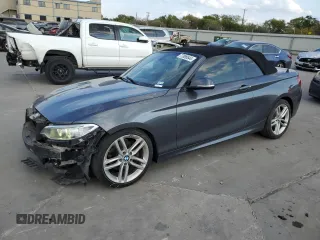 2015 BMW 2 Series 228i with VIN WBA1K5C5XFV473884, listed as a Copart auction lot 77896644 with 76,419 mi miles and Salvage Title. Bid and sale history available at carsss.com. Image 1.