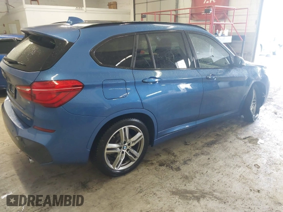 2019 BMW X1 xDrive28i with VIN WBXHT3C53K5L36690, listed as a IAAI auction lot 42012992 with 70,339 mi miles. Bid and sale history available at carsss.com. Image 4.