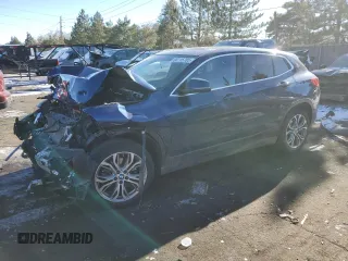 2018 BMW X2 xDrive28i with VIN WBXYJ5C37JEF69697, listed as a Copart auction lot 88116785 with 48,721 mi miles and Salvage Title. Bid and sale history available at carsss.com. Image 1.