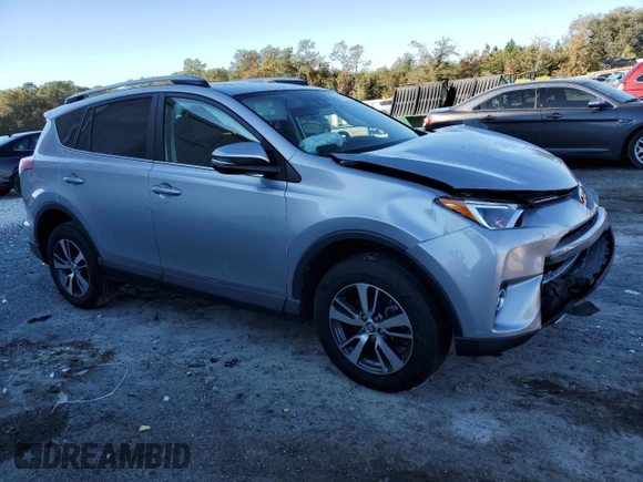 2018 Toyota RAV4 XLE with VIN 2T3RFREV8JW725504, listed as a Copart auction lot 84792264 with 41,501 mi miles and Salvage Title. Bid and sale history available at carsss.com. Image 4.