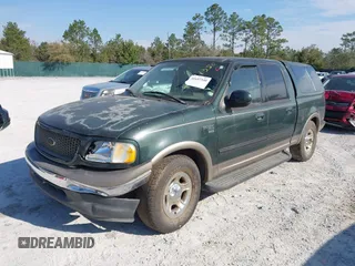 2003 Ford F-150 XLT with VIN 1FTRW07L53KA64064, listed as a IAAI auction lot 41697350 with 227,114 mi miles. Bid and sale history available at carsss.com. Image 17.