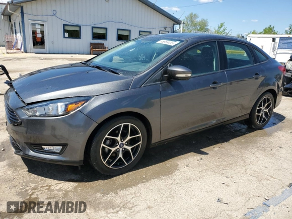 2018 Ford Focus SE z VIN 1FADP3F20JL257320, wystawiony jako Copart lot #55956435 z przebiegiem 26 919 mil mil oraz Szkoda całkowita • Salvage title. Historia ofert i sprzedaży dostępna na DreamBid. Obrazek 1.