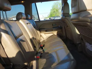 2004 Honda Pilot EX with VIN 2HKYF18614H535377, listed as a IAAI auction lot 42099729 with 362,460 mi miles. Bid and sale history available at carsss.com. Image 8.