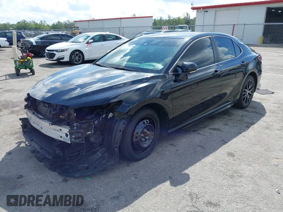 2023 Toyota Camry SE with VIN 4T1G11AK6PU741172, listed as a IAAI auction lot 41599909 with 56,668 mi miles and . Bid and sale history available at DreamBid. Image 21.