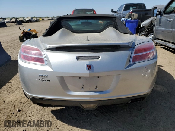 2008 Saturn Sky z VIN 1G8MC35B88Y125341, wystawiony jako Copart lot #73589564 z przebiegiem 21 597 mil mil oraz Szkody całkowita. Historia ofert i sprzedaży dostępna na DreamBid. Obrazek 6.