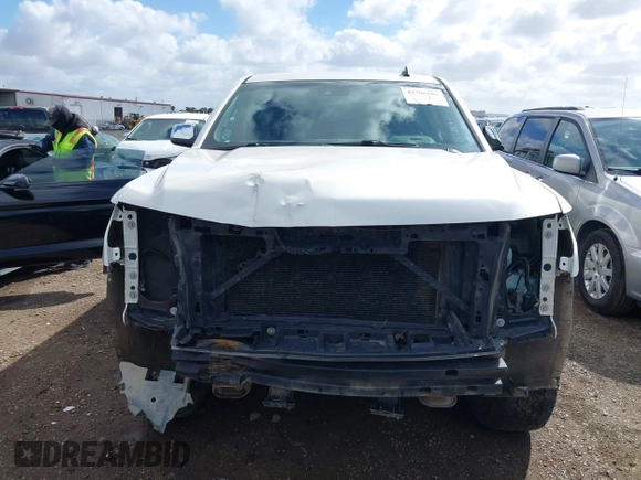 2015 Chevrolet Suburban LTZ with VIN 1GNSKKKC5FR127201, listed as a IAAI auction lot 41706562 with 151,644 mi miles and . Bid and sale history available at DreamBid. Image 6.