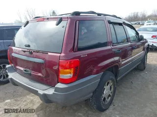 2001 Jeep Grand Cherokee Laredo with VIN 1J4GW48S51C739725, listed as a IAAI auction lot 41800431 with 220,396 mi miles. Bid and sale history available at carsss.com. Image 4.