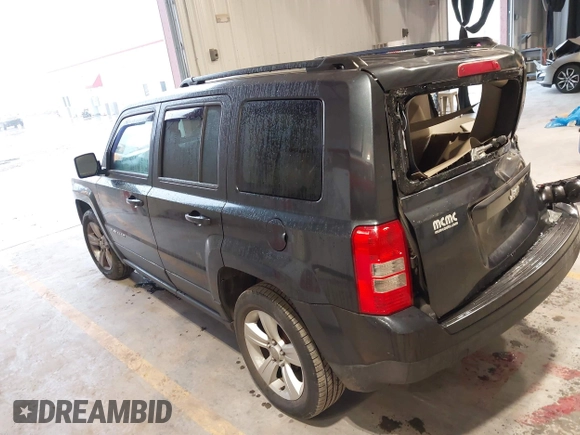 2014 Jeep Patriot Latitude with VIN 1C4NJPFA0ED633657, listed as a IAAI auction lot 41447982 with 104,664 mi miles and . Bid and sale history available at carsss.com. Image 3.