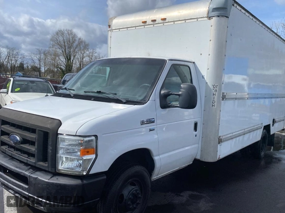 2009 Ford Econoline Cargo with VIN 1FDWE35LX9DA36683, listed as a Copart auction lot 50453625 with 309,448 mi miles and Salvage Title. Bid and sale history available at DreamBid. Image 2.