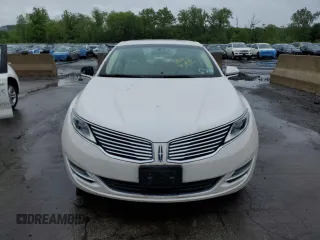 2015 Lincoln MKZ z VIN 3LN6L2J9XFR605027, wystawiony jako Copart lot #57724605 z przebiegiem 76 845 mil mil oraz Czysty tytuł • Clean title. Historia ofert i sprzedaży dostępna na DreamBid. Obrazek 5.