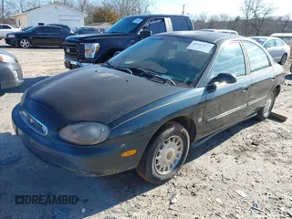 1998 Mercury Sable LS Premium Group z VIN 1MEFM53S0WA638842, wystawiony jako IAAI lot #41557457 z przebiegiem 153 443 mil mil oraz . Historia ofert i sprzedaży dostępna na DreamBid. Obrazek 2.