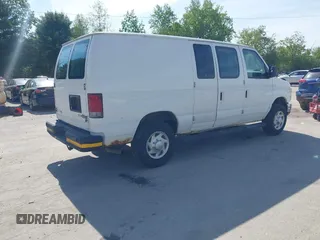 2014 Ford Econoline Cargo Commercial with VIN 1FTNE2EW2EDA18970, listed as a IAAI auction lot 42375174 with 174,022 mi miles and . Bid and sale history available at DreamBid. Image 4.