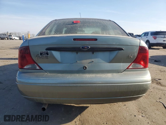 2004 Ford Focus SE with VIN 1FAFP34314W127053, listed as a Copart auction lot 48652265 with 241,841 mi miles and Salvage title. Bid and sale history available at DreamBid. Image 6.