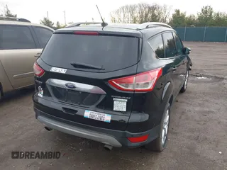 2016 Ford Escape Titanium with VIN 1FMCU0J91GUC69895, listed as a IAAI auction lot 41488171 with 162,232 mi miles. Bid and sale history available at carsss.com. Image 4.