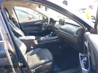 2018 Mazda CX-9 Touring with VIN JM3TCBCY3J0228231, listed as a IAAI auction lot 41596236 with 133,481 mi miles and . Bid and sale history available at DreamBid. Image 5.