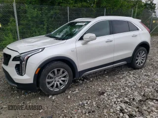 2021 Cadillac XT4 FWD Premium Luxury с VIN 1GYFZCR4XMF050649, выставлен на аукционе Copart как лот 58714445 с пробегом 33 233 миль миль и На запчасти • Non repairable. История ставок и продаж доступна на DreamBid. Изображение 1.