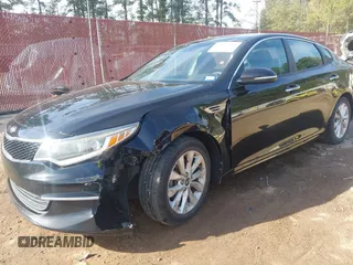 2017 Kia Optima LX with VIN 5XXGT4L33HG141559, listed as a IAAI auction lot 41863912 with 148,250 mi miles. Bid and sale history available at carsss.com. Image 2.
