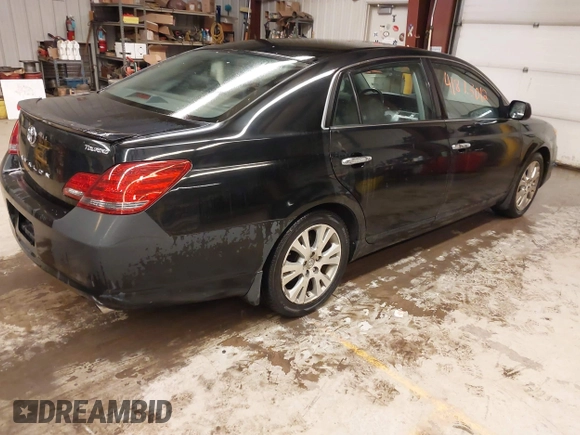 2008 Toyota Avalon XL with VIN 4T1BK36B98U286881, listed as a IAAI auction lot 41873012 with 176,054 mi miles. Bid and sale history available at carsss.com. Image 4.