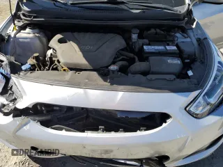 2017 Hyundai Accent SE z VIN KMHCT4AEXHU179394, wystawiony jako Copart lot #57889085 z przebiegiem 76 006 mil mil oraz Szkoda całkowita • Salvage title. Historia ofert i sprzedaży dostępna na DreamBid. Obrazek 11.