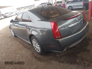 2011 Cadillac CTS Luxury with VIN 1G6DF5EY6B0104932, listed as a IAAI auction lot 42032457 with 165,833 mi miles and . Bid and sale history available at DreamBid. Image 3.