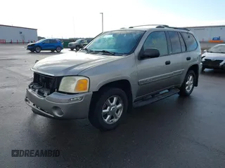 2003 GMC Envoy SLT with VIN 1GKDT13S532308502, listed as a IAAI auction lot 41676188 with 218,626 mi miles. Bid and sale history available at carsss.com. Image 17.