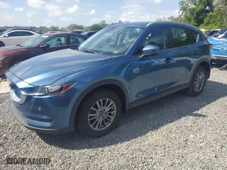 2018 Mazda CX-5 Sport with VIN JM3KFABM2J1406068, listed as a Copart auction lot 52354125 with 127,338 mi miles and Salvage Title. Bid and sale history available at carsss.com. Image 1.