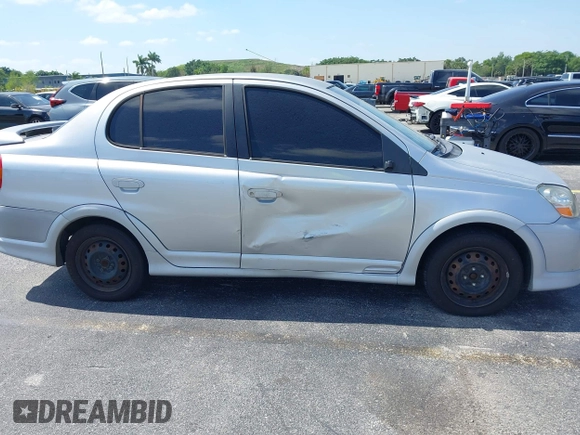 2003 Toyota ECHO with VIN JTDBT123935047533, listed as a IAAI auction lot 42143695 with 170,911 mi miles. Bid and sale history available at carsss.com. Image 6.