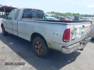 2002 Ford F-150 XL with VIN 1FTRX17W22NA55784, listed as a IAAI auction lot 41958686 with 278,064 mi miles. Bid and sale history available at carsss.com. Image 3.