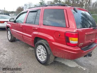 2004 Jeep Grand Cherokee Limited with VIN 1J4GW58S94C299311, listed as a IAAI auction lot 41912467 with 55,736 mi miles. Bid and sale history available at carsss.com. Image 3.