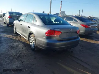 2015 Volkswagen Passat 1.8T S with VIN 1VWAT7A35FC093034, listed as a IAAI auction lot 41667700 with 127,649 mi miles. Bid and sale history available at carsss.com. Image 3.