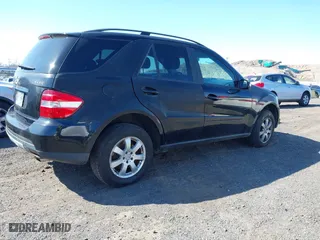 2006 Mercedes-Benz M-Class 3.5L with VIN 4JGBB86E06A121940, listed as a IAAI auction lot 42069185 with 127,660 mi miles. Bid and sale history available at carsss.com. Image 4.