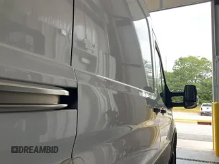 2021 Ford Transit Cargo with VIN 1FTBR1CG4MKA80751, listed as a IAAI auction lot 42859733 with 80,844 mi miles and . Bid and sale history available at DreamBid. Image 12.