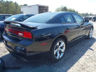 2011 Dodge Charger Road/Track with VIN 2B3CL5CT8BH506814, listed as a IAAI auction lot 41890437 with 240,836 mi miles. Bid and sale history available at carsss.com. Image 4.