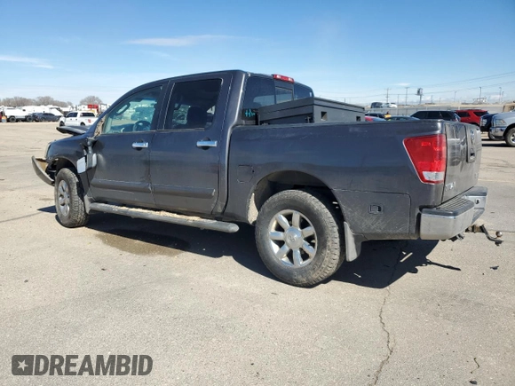 2004 Nissan Titan LE with VIN 1N6AA07B24N575053, listed as a Copart auction lot 50370985 with 230,225 mi miles and Salvage title. Bid and sale history available at DreamBid. Image 2.