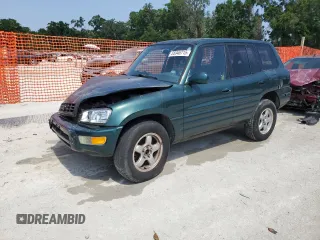 2000 Toyota RAV4 z VIN JT3HP10V3Y7165886, wystawiony jako Copart lot #55946715 z przebiegiem 136 518 mil mil oraz Szkoda całkowita • Salvage title. Historia ofert i sprzedaży dostępna na DreamBid. Obrazek 1.