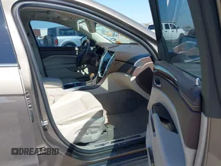 2015 Cadillac SRX Performance Collection with VIN 3GYFNCE31FS598109, listed as a IAAI auction lot 41788267 with 172,488 mi miles and . Bid and sale history available at DreamBid. Image 5.