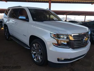 2016 Chevrolet Tahoe LTZ with VIN 1GNSKCKC4GR359442, listed as a IAAI auction lot 41871814 with 158,533 mi miles. Bid and sale history available at carsss.com. Image 1.