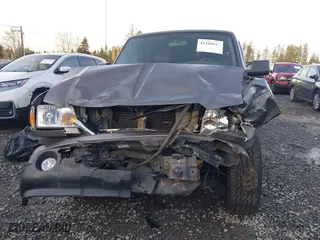 2011 Ford Ranger XLT with VIN 1FTLR4FE6BPA39117, listed as a IAAI auction lot 41388849 with 215,294 mi miles. Bid and sale history available at carsss.com. Image 6.