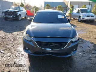 2014 Mazda 6 i Grand Touring with VIN JM1GJ1W50E1107877, listed as a IAAI auction lot 41857596 with 166,188 mi miles and . Bid and sale history available at DreamBid. Image 13.