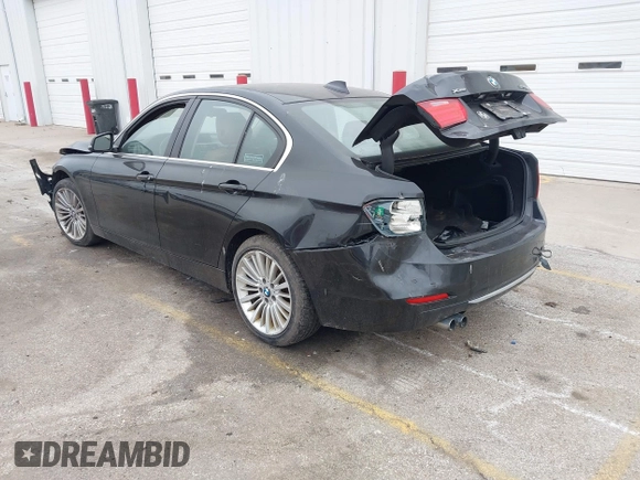 2014 BMW 3 Series 328i xDrive with VIN WBA3B5G56ENS06534, listed as a IAAI auction lot 41549553 with 165,779 mi miles and . Bid and sale history available at DreamBid. Image 3.