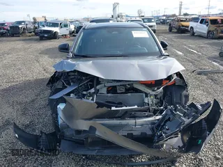 2024 Toyota bZ4X XLE z VIN JTMABACA2RA069207, wystawiony jako IAAI lot #41632667 z przebiegiem 7329 mil mil oraz . Historia ofert i sprzedaży dostępna na DreamBid. Obrazek 13.